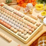 "Mantou Keycap Set: whimsical, rounded MOG profile keycaps from various angles, highlighting soft pastel colors and cute, comfortable design."