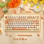 "Mantou Keycap Set showcasing whimsical, soft pastel keycaps with a rounded MOG profile, designed for cute comfort and a playful desk setup."