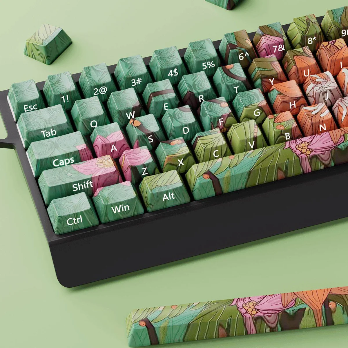 Wild Lotus Keycap Set showcasing durable PBT material and elegant side-lit design from multiple angles, highlighting the serene lotus motif.