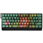 Artistic shots of the Wild Lotus PBT keycap set, highlighting its durable PBT construction and subtle side-lit glow from various perspectives.