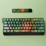Wild Lotus Keycap Set, durable PBT. Multiple views highlight the elegant wild lotus motif and subtle side-lit glow, showcasing artistic serenity.