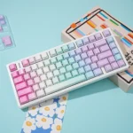 Vibrant Y2K PBT keycaps set, showcasing its playful, bold retro-futuristic design and early 2000s digital aesthetic for your keyboard.