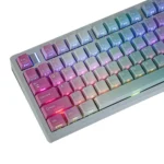 Vibrant Y2K PBT keycaps set from a playful angle, highlighting its retro style and bold early 2000s digital aesthetic for your keyboard.