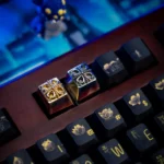 Close-up of a premium Pure Brass Yu-Gi-Oh! Cross Artisan Keycap, showcasing its intricate design and gleaming metallic finish.