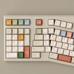Vibrant AIer PBT Keycaps Set showcasing playful AI and designer iconography, modern tech aesthetic, and premium PBT quality, perfect for creative minds.