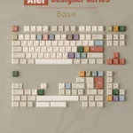 AIer PBT Keycaps base set, showcasing playful AI and designer iconography in vibrant colors with pixel art elements, crafted from premium PBT.