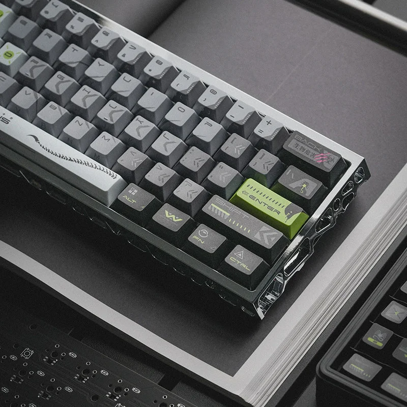 Alien Terror backlit PBT keycap set, showcasing its transparent, sci-fi inspired design and eerie glow from multiple angles for custom keyboards.