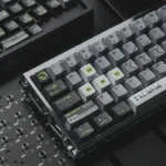 Alien Terror backlit PBT keycap set, transparent and alien-inspired, revealing its eerie glow-through design from multiple angles.