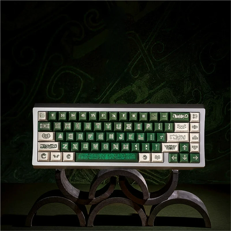 Timeless Ancient Bronze Artistry Keycaps Set main image, featuring intricate weathered patterns inspired by ancient Chinese artifacts, evoking historical design.