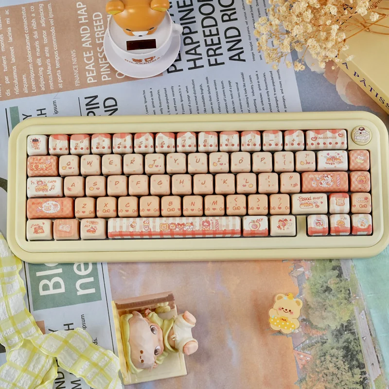 Whimsical Baking Cat Artisan Keycap Set showcasing an adorable cat baking with soft bread, a charming PBT MOA accent for keyboards.