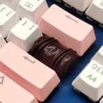 Artisan chocolate resin keycap, handcrafted with a smooth, gourmet chocolate finish, shown in multiple views for keyboard personalization.