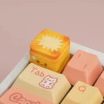 Close-up of a whimsical handcrafted miniature roasted food artisan keycap, showcasing its detailed texture and warm culinary aesthetic from a unique design.