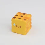 Close-up of a whimsical handcrafted artisan food keycap, showcasing its miniature roasted details and warm culinary aesthetic from an inviting design.