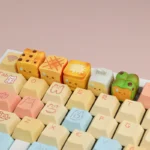 Close-up of whimsical handcrafted miniature roasted artisan food keycaps, showcasing intricate details and a warm culinary aestetics.