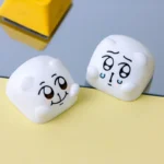 Whimsical Chimitan artisan resin keycap, meticulously handcrafted, revealing its adorable character and expressive details from all angles. A unique design.