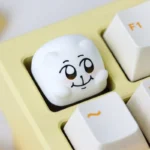 Whimsical Chimitan artisan resin keycap gallery, highlighting its adorable handcrafted design and expressive character from multiple playful angles.