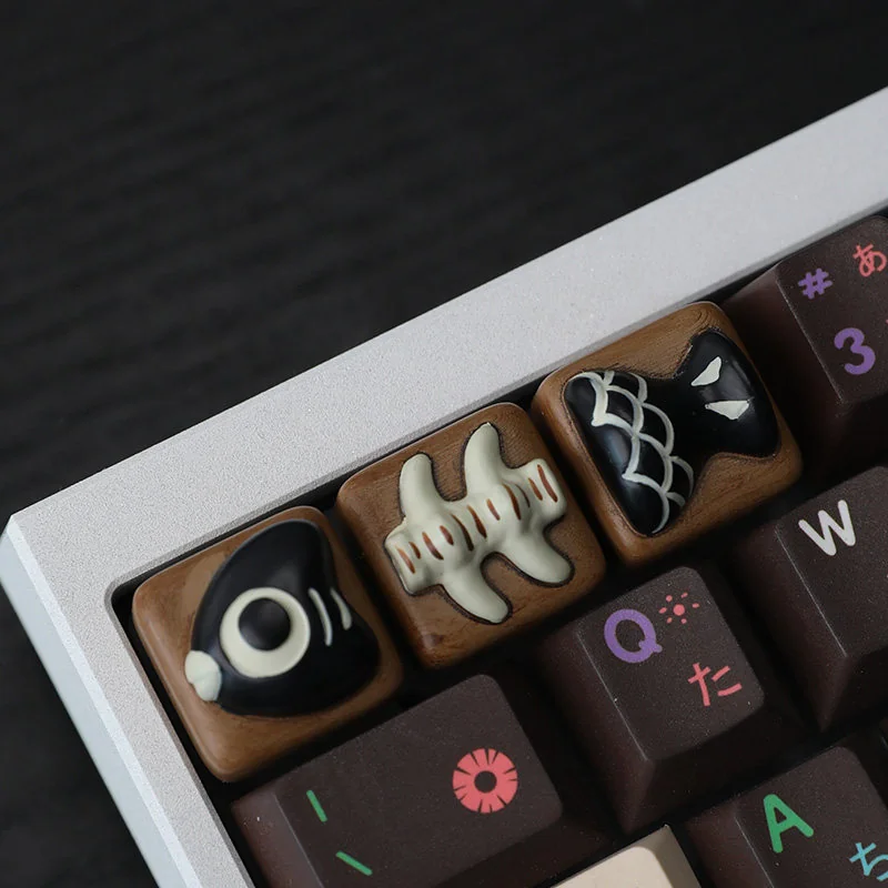 Whimsical Fish Bone Artisan Keycap, uniquely handcrafted from resin, showcasing vibrant aquatic charm and artistic detail.