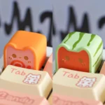 Whimsical handcrafted artisan keycap: an adorable cat toast from a miniature toast snack. This charming, food-themed ESC keycap adds playful charm.