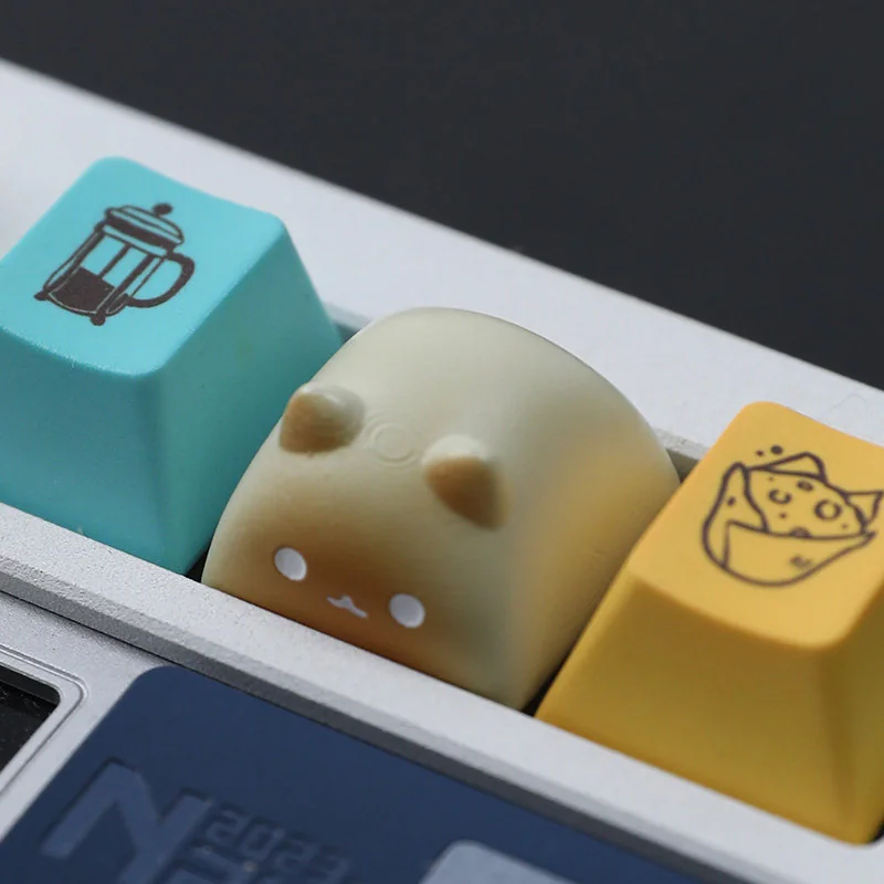 Charming Wangzai Cat & Takoyaki artisan resin keycap, a detailed miniature sculpture showcasing its unique playful design from various perspectives.