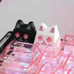 Artisan whimsical cat keycap for ESC, glowing with translucent hues, perfect for RGB mechanical keyboards.