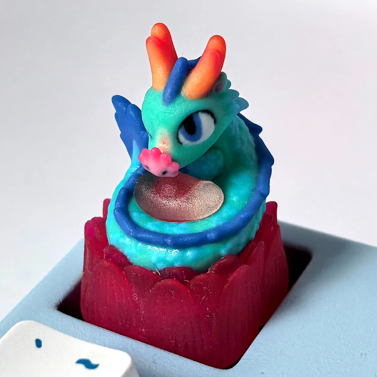 Handcrafted 3D translucent Azure Dragon artisan keycap, showcasing an intricate glowing sculpture with a mystical fantasy aesthetic.