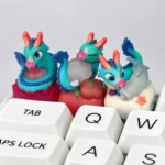 A stunning handcrafted 3D translucent resin Azure Dragon artisan keycap, glowing with mystical light, showcasing intricate details for mechanical keyboards.