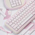 Elegant Ballet Poetry PBT Dye-Sublimated Keycap Set artfully displayed from a graceful angle, highlighting its soft pastel hues and delicate ballet motifs.