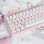 Elegant Ballet Poetry PBT Dye-Sublimated Keycap Set, angled. Soft pastel PBT keycaps with ballet motifs and graceful lines, sweet art.