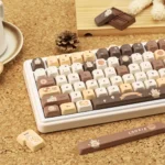 Detailed shot of Whimsical Bear Bakery PBT keycaps set, revealing adorable dye-sub bears and pastries in soft pastel tones, showcasing their unique charm.