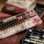 Close-up views of Berry Cocoa PBT dye-sublimated keycaps set, highlighting their warm berry and rich cocoa tones for a cozy, sophisticated keyboard aesthetics.