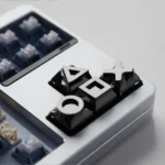 Black Piano Gaming Console Button Keycaps for gaming consoles, showcasing a sleek, durable alloy design perfect for serious gamers.