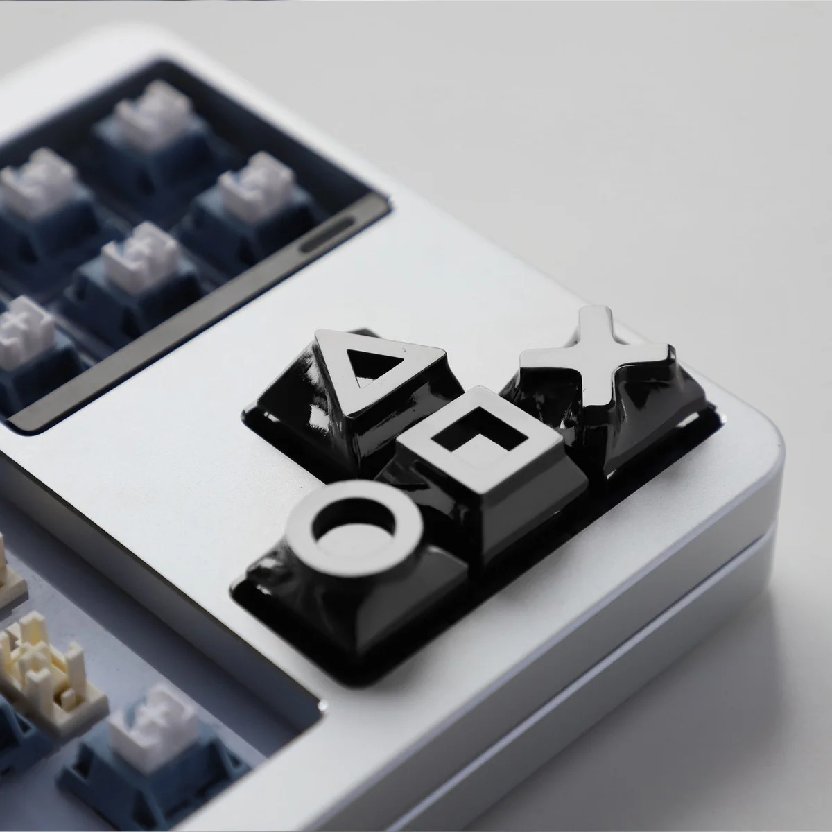 Black Piano Gaming Console Button Keycaps for gaming consoles, showcasing a sleek, durable alloy design perfect for serious gamers.