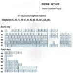 Ethereal Misty Blue Butterfly PBT Dye-Sub Keycaps set, showcasing delicate pastel blue butterflies from various angles for a dreamy keyboard.