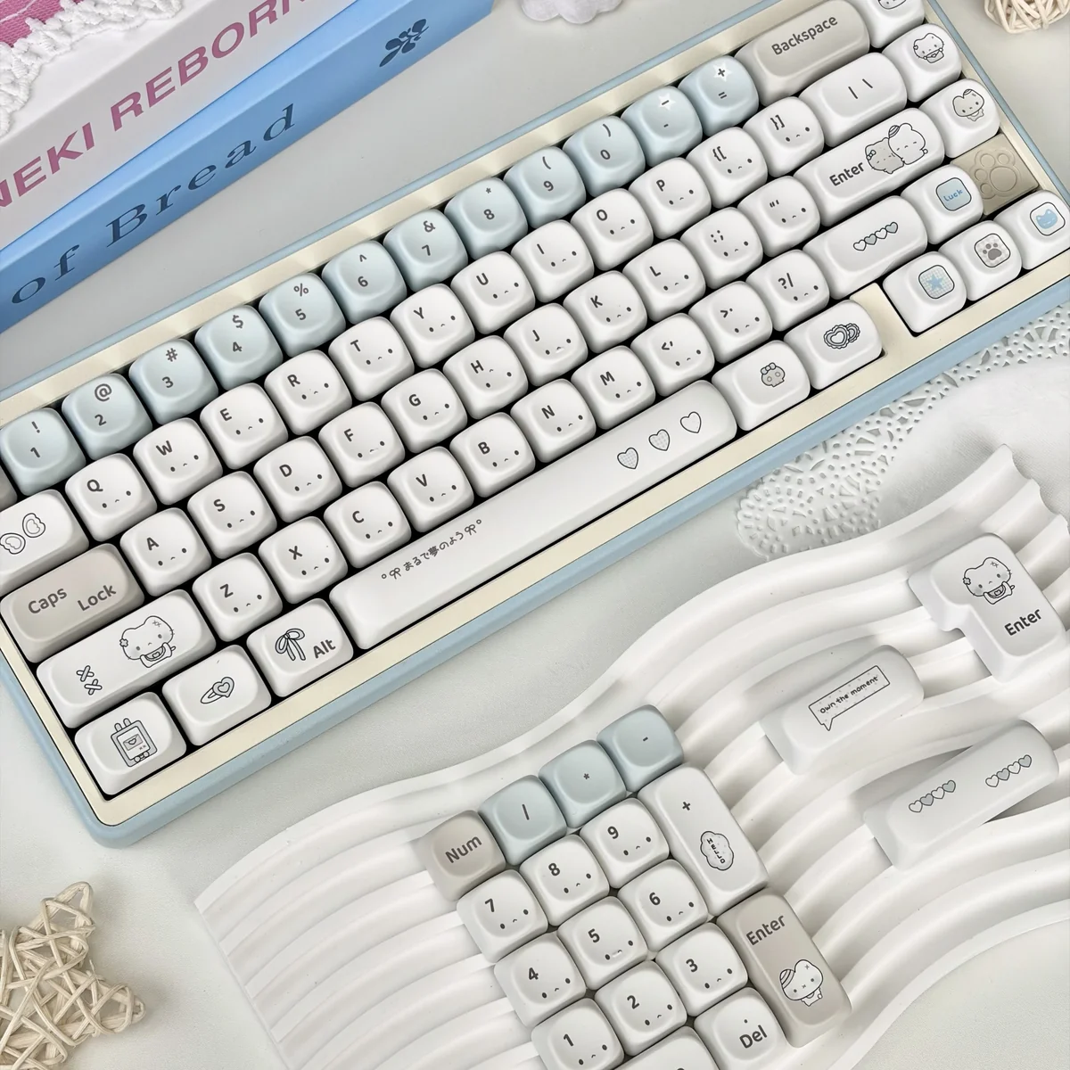 A gallery view of Blue Dazed Cat Series Keycap Set, showcasing multiple playful designs and versatile profiles from various angles. Each keycap features charming design.