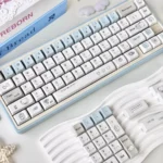 Multiple views of Blue Dazed Cat Series Keycap Set: playful cat illustrations, soft pastels. Adorable, versatile profiles.