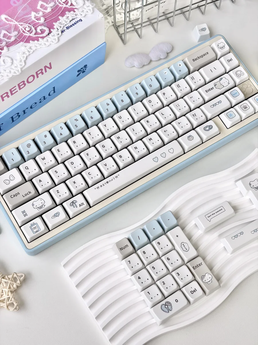 Multiple views of Blue Dazed Cat Series Keycap Set: playful cat illustrations, soft pastels. Adorable, versatile profiles.