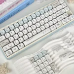 A charming close-up of Blue Dazed Cat Series Keycap Set, highlighting their adorable, whimsical pastel cat designs and the versatile profiles from a fresh perspective view.