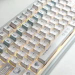 Multiple Blue Dazed Cat Series Keycap Set from various angles, showcasing playful pastel designs and versatile profiles for whimsical keyboard customization.