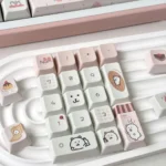 Whimsical Bread Bear keycaps set: unique character design from multiple angles, cozy Cherry profile. Features warm, playful illustrations.