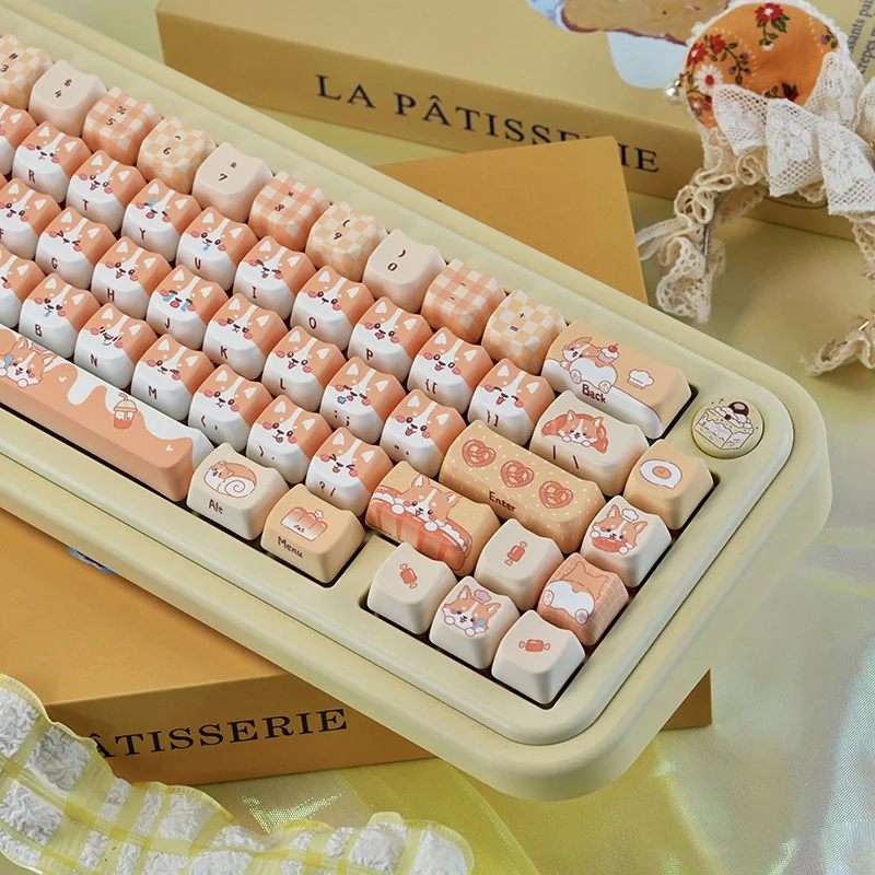 Bread Corgi MAO Keycap Set, featuring its adorable bread-inspired design and rounded aesthetics from different playful perspectives.