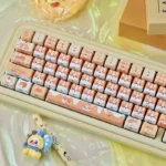 A gallery of Bread Corgi MAO Keycap Set, showcasing the whimsical, bread-inspired design from various playful angles, perfect for canidae lovers.