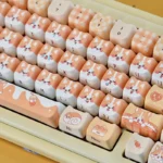 Bread Corgi MAO Keycap Set displayed from a new angle, showcasing its whimsical bread-inspired design and playful rounded aesthetics.