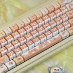 Bread Corgi MAO Keycap Set from a different angle, showcasing its charming, bread-inspired design and playful rounded aesthetics.