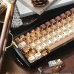 Brew-tiful 'Refraction' coffee PBT keycap set, showcasing charming cat accents and modern translucent effects for mechanical keyboards.