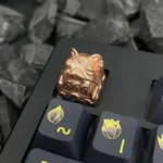 Close-up of a handcrafted Bright Fortune Cat Keycaps, showcasing its intricate Cat design from multiple premium angles.