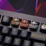 Close-up of a handcrafted Oni keycap from multiple angles, showcasing its intricate Japanese warrior design and premium aged finish.