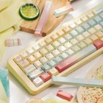 Vibrant PBT dye-sub Bubbly Ramune keycaps set, angled to show refreshing hues with playful bubbly soda accents.