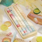 Close-up of vibrant PBT dye-sub Bubbly Ramune keycaps set, featuring refreshing hues with playful soda-inspired bubbly accents.