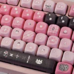 Sweet Cool Bunny Keycap Set close-up, revealing its artistic black and pink design from a fresh perspective, highlighting the unique edgy-cute aesthetic.
