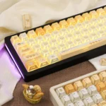 Playful Burnt Toast PBT dye-sublimated keycaps set, uniquely toasted, with crisp legends at various angles, mimicking burnt bread.